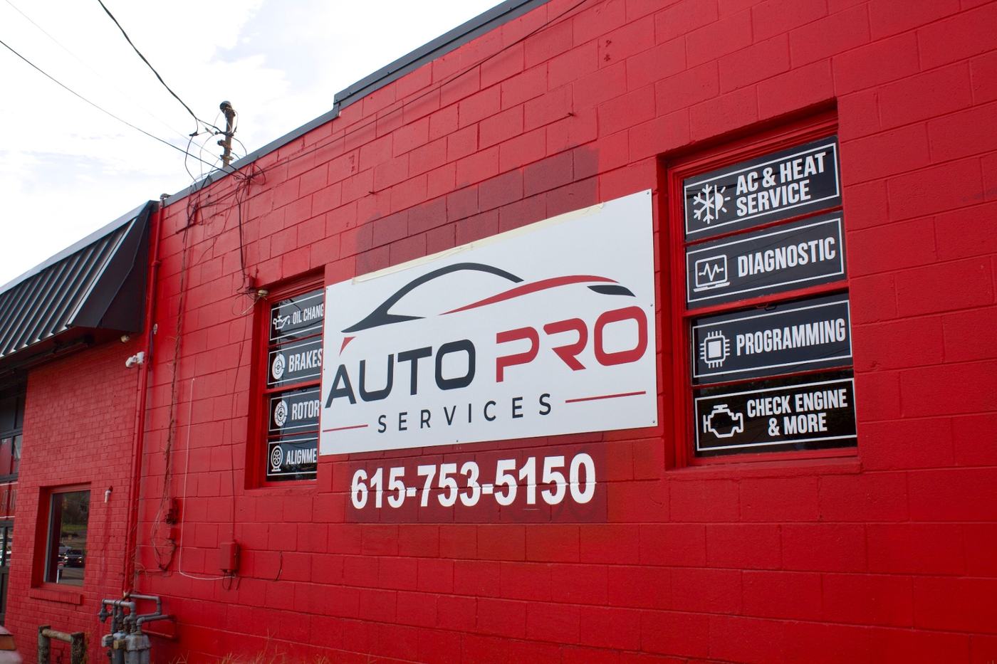 Auto Pro Services shop sign listing auto repair services in Nashville, TN